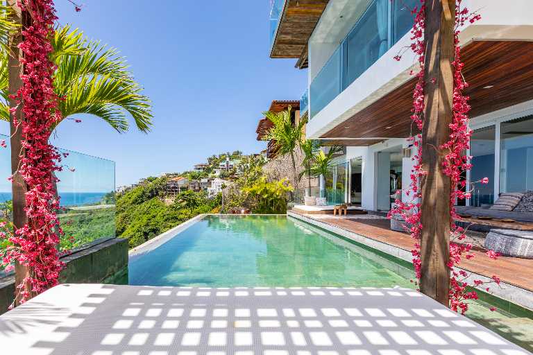 An Architectural Masterpiece Above the Atlantic with Refined Interiors & Oceanfront Living — photo 4 of 64 (villa, Joá, Rio de Janeiro)