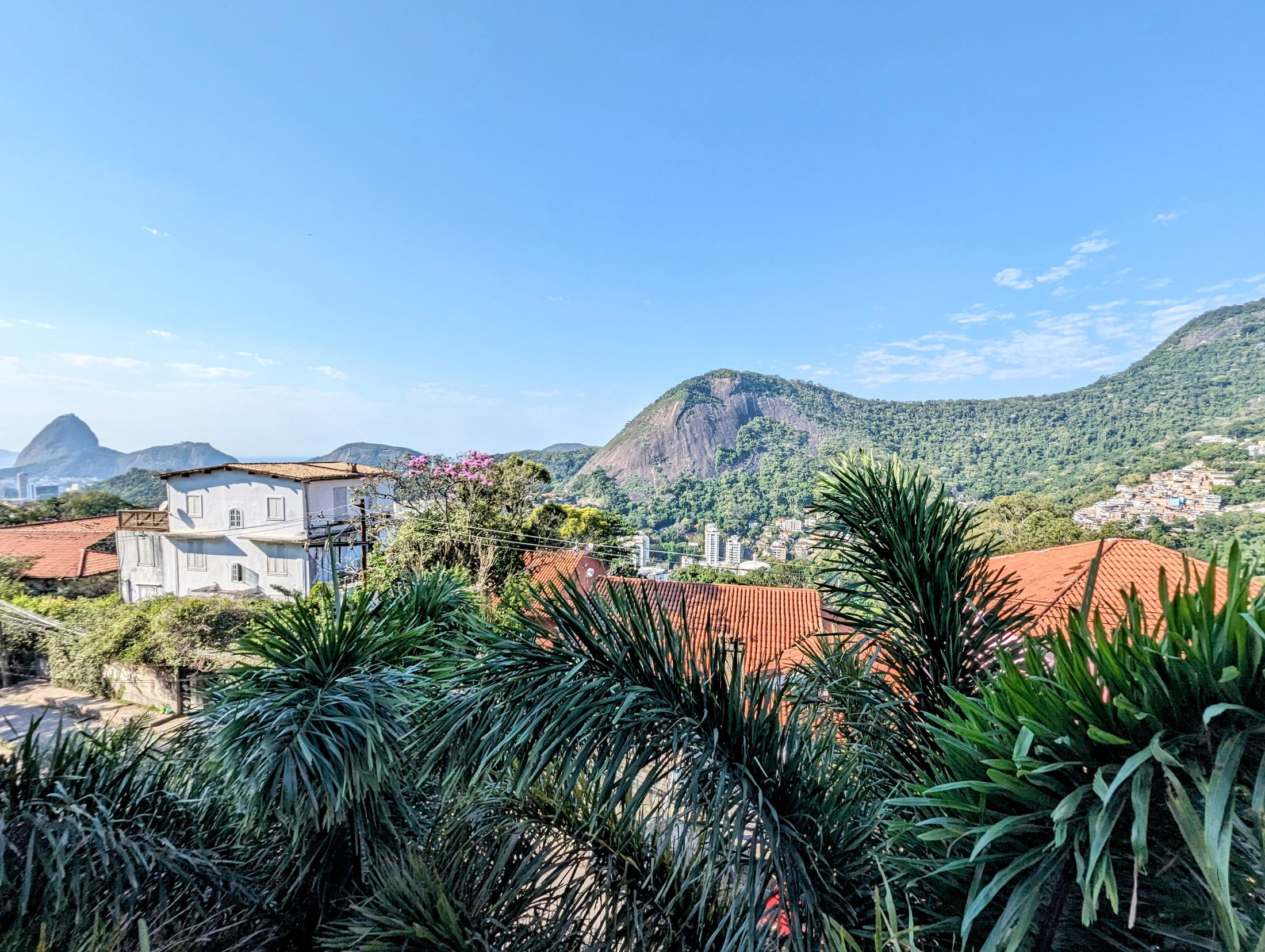 A spectacular 5-bedroom home—featuring 3 suites—with cinematic views of Christ the Redeemer and Sugarloaf Mountain.
